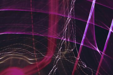 A dynamic display of pink and purple abstract light streaks, creating a vivid and modern artistic effect.