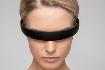 woman wearing black Alice band