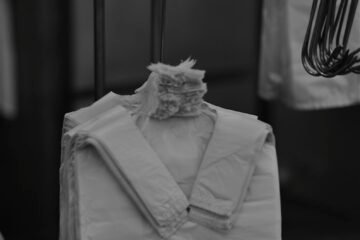 grayscale photo of dress shirt