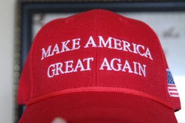 a red hat that says make america great again
