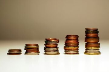 Stacks of coins increasing in height from left to right