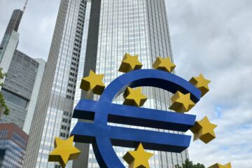 a large blue and yellow sign with stars on it