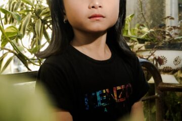 a person sitting on a bench