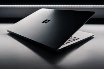 A laptop computer sitting on top of a table