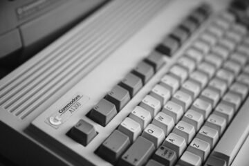 A vintage Commodore A1200 computer keyboard with grey and white keys