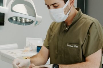 a dentist examining a patient