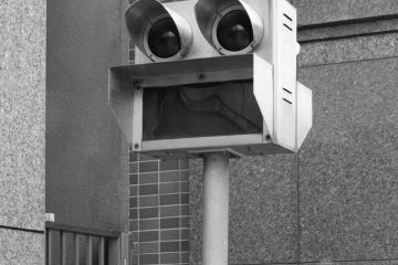 A traffic signal mounted on a pole.